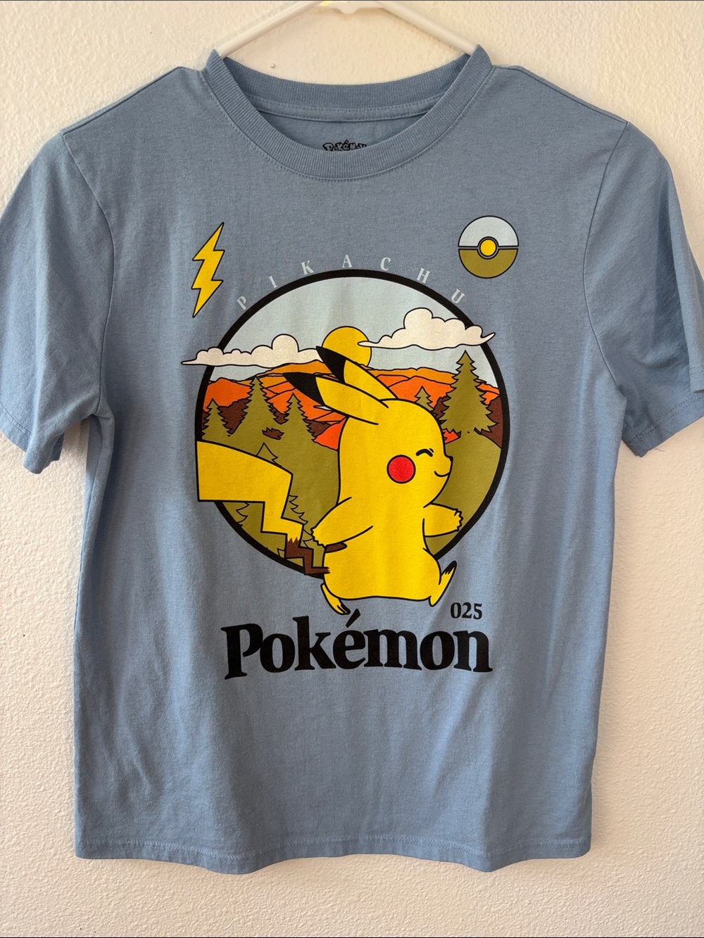 Pokemon Blue Tee with Yellow Pikachu Scenic Graphic